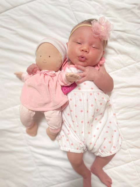 Baby Girl Doll with Pink Onesie